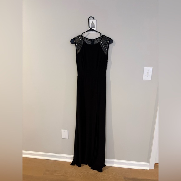 Dillards Dresses & Skirts - Chic Black Maxi Dress with Embellished Shoulders